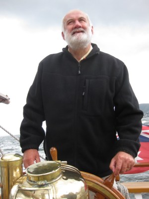 At the helm, Lady Nelson