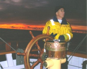 Brian Hodgson at the helm of Lady Nelson