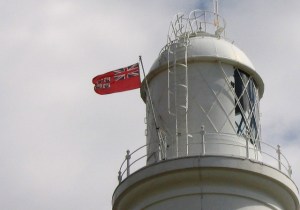 Trinity House flag flying on Portland Bill lighthouse