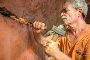 Shane tackling some of the never-ending maintenance of <em>Vega</em>